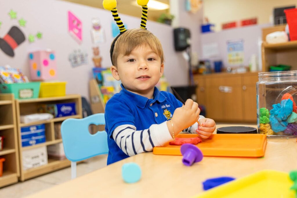 Children using educational materials during classroom activities in Miami
